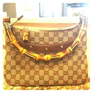 Gorgeous Gucci bamboo handle with gold studs!